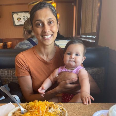 Usha Vance and her kid were photographed by her husband, JD Vance, in a restaurant.